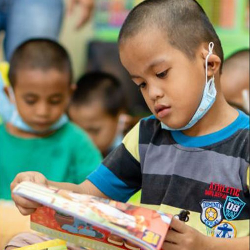 Child Reading Book